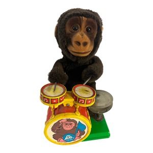 Vintage Alps Drumming Monkey playing Drums.